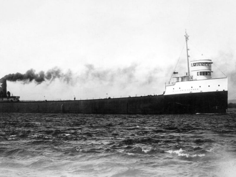 A black and white photo of the steamship William H. Donner with smoke billowing from the smoke stack.